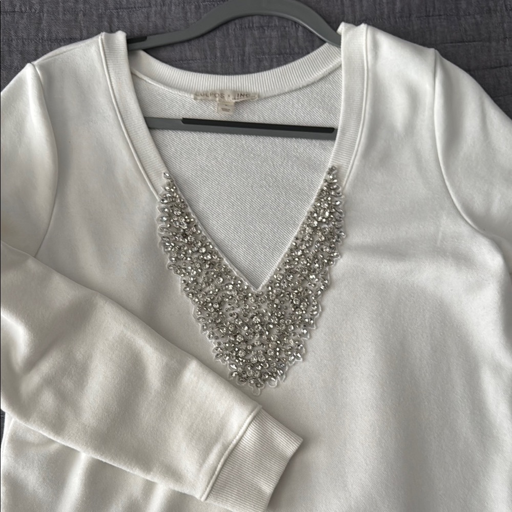 White Sweatshirt with Silver Embellishments